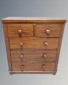 A Victorian mahogany and pine two over three five drawer chest.