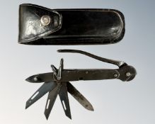 A scarce World War II escape evasion folding knife,