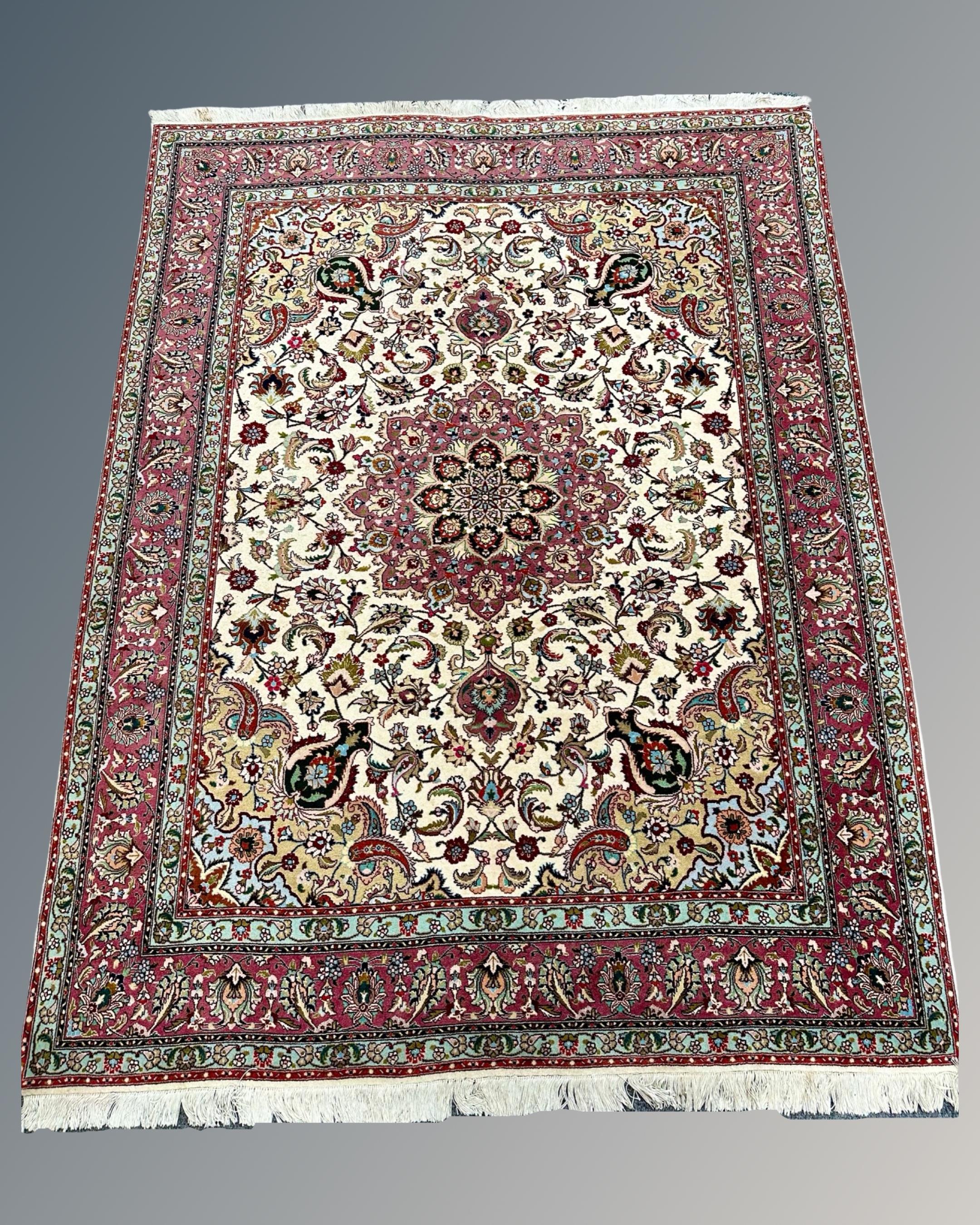 An Isfahan rug, Central Iran, 151cm by 200cm.