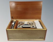 A mid-20th century BSR table reel to reel music centre together with a valve radio.