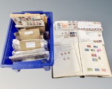 A box of a large quantity of stamps on paper to include commemorative covers etc