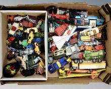 A box of vintage play-worn die cast vehicles including Dinky,