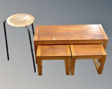 A nest of three 20th century tables together with a 20th century laboratory stool on metal legs.