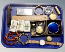 A tray containing a cut glass silver rimmed salt, assorted pocket watches,