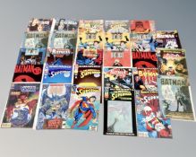 54 DC comics featuring Batman and Superman.