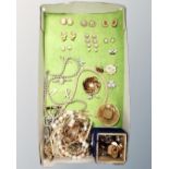 A tray containing a quantity of gilt finish costume jewellery,