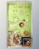 A tray containing a quantity of gilt finish costume jewellery,