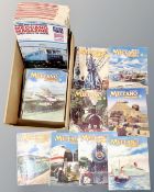 A box containing vintage Meccano magazines.