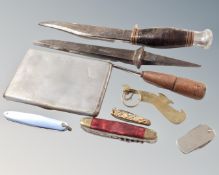 A box containing a 20th century English hunting knife, assorted hunting knives, bottle opener,