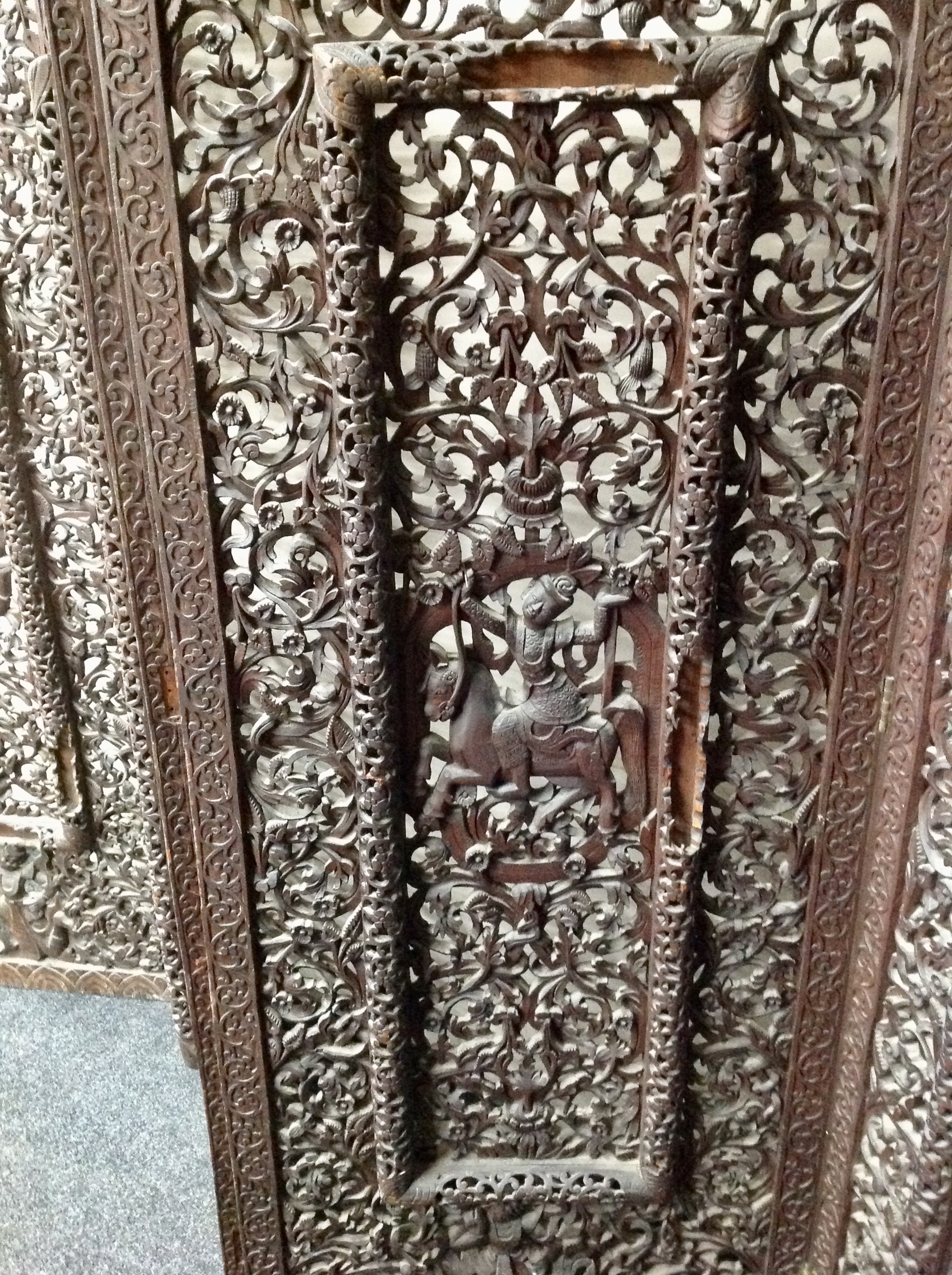 An Indonesian heavily carved four fold screen, - Image 4 of 7