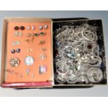 A tray containing a large quantity of silver tone costume jewellery together with costume earrings