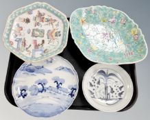 A tray containing four assorted antique and later Chinese porcelain dishes and plates.