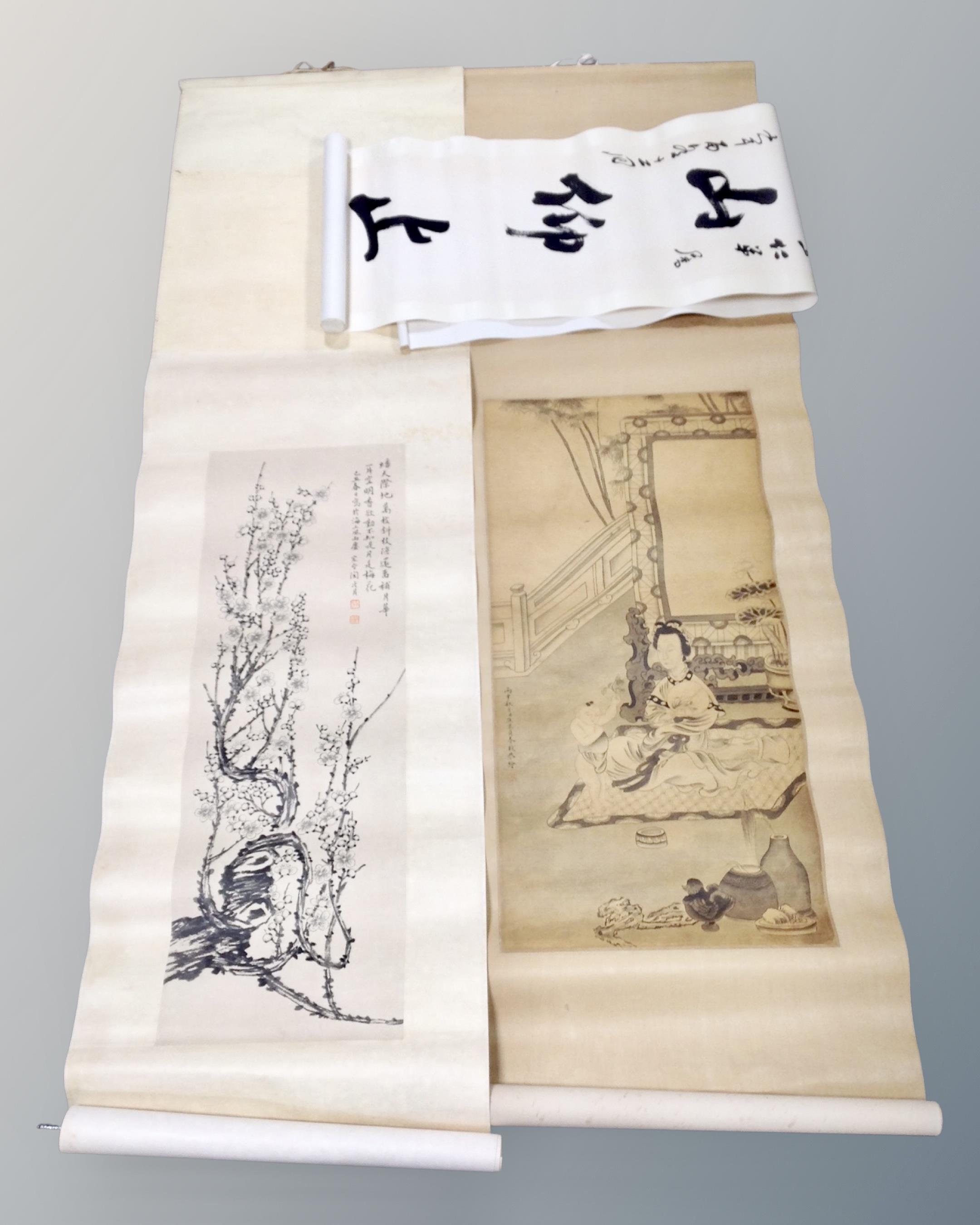 Three Japanese watercolour scrolls depicting cherry blossom, geisha and script.