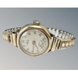 A lady's 9ct gold Avia wristwatch on plated expansion bracelet.