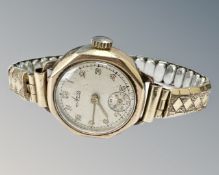 A lady's 9ct gold Avia wristwatch on plated expansion bracelet.