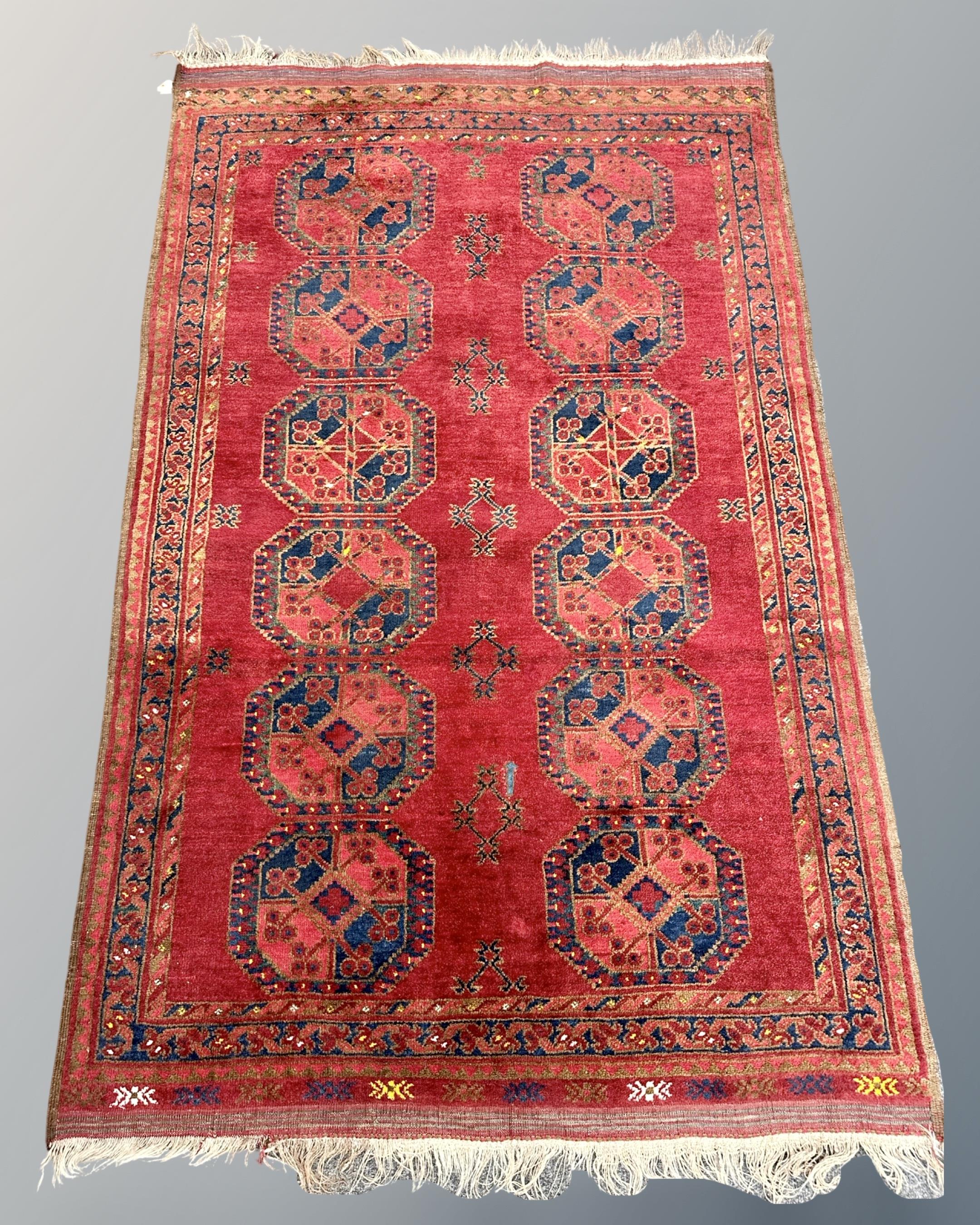 A Bokhara rug, Afghanistan, 128cm by 202cm.