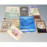 A box containing vintage car workshop books and manuals including Ford, Morris Minor, Riley.