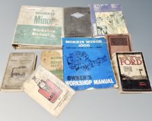 A box containing vintage car workshop books and manuals including Ford, Morris Minor, Riley.