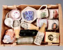 A box containing antique and later glass and later pottery bottles, skater figure,