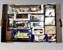 A box containing boxed plastic and die cast vehicles including Days Gone, Corgi, 1902 State Lendau,