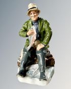 A Royal Doulton figure A Good Catch HN2258.