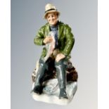 A Royal Doulton figure A Good Catch HN2258.