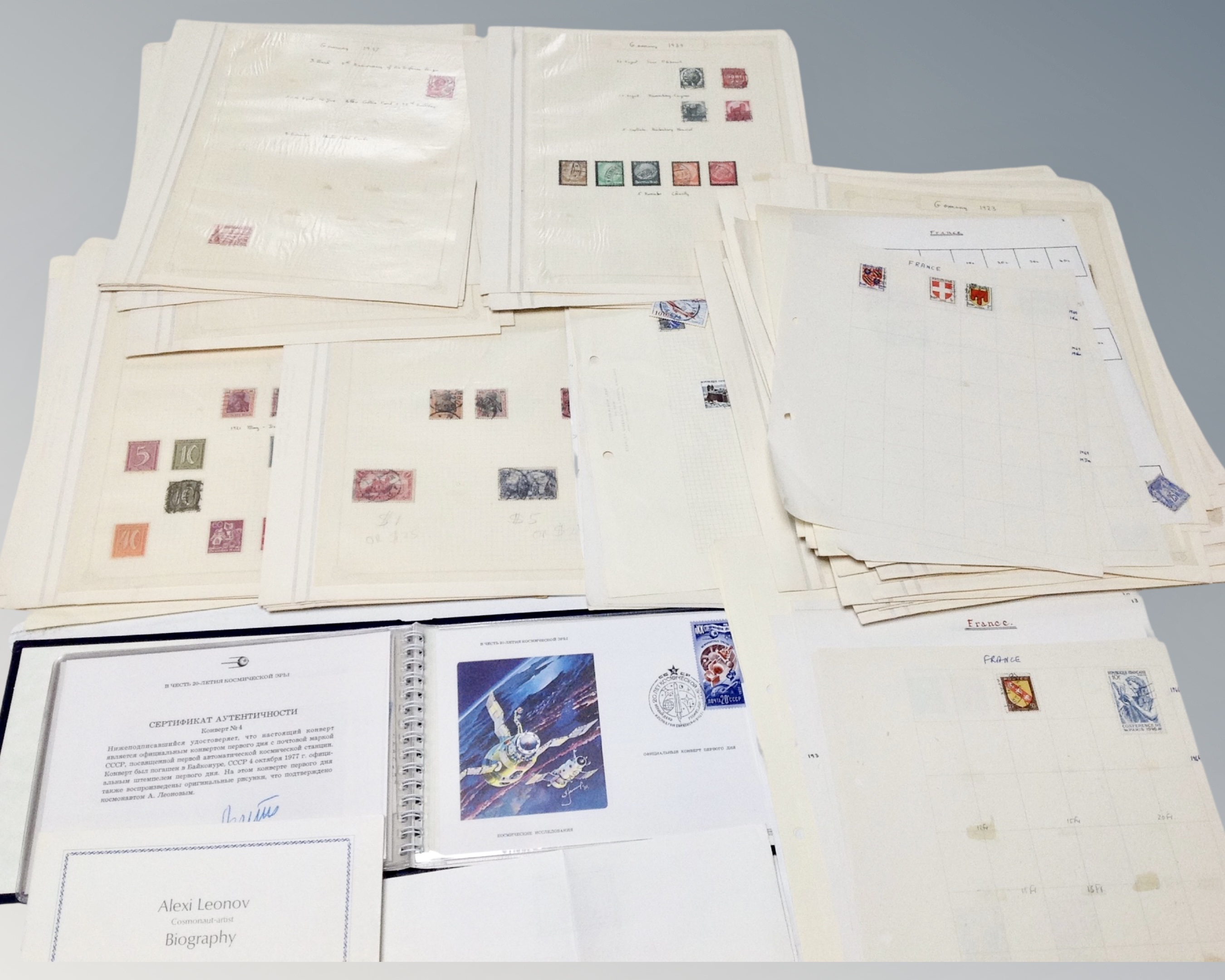 A quantity of antique and later French and German stamps on paper together with Franklin Philatelic