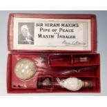 A vintage Sir Hiram Maxim's Pipe of Peace and Maxim inhaler, in original box.