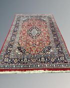A Keshan carpet, Central Iran, 203cm by 292cm.