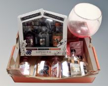 A box containing assorted gin miniatures including a Sipswith gift set together with a Gordons Gin