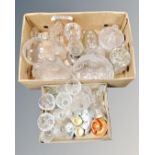 Two boxes containing a quantity of assorted glassware, oil lamp, jelly mould etc.