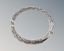 A 925 silver textured bangle with push catch.
