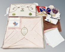 Two sets of vintage quality table linen together with a handkerchief bag and vintage handkerchiefs