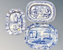 A 19th century blue and white willow pattern meat plate together with two further 19th century
