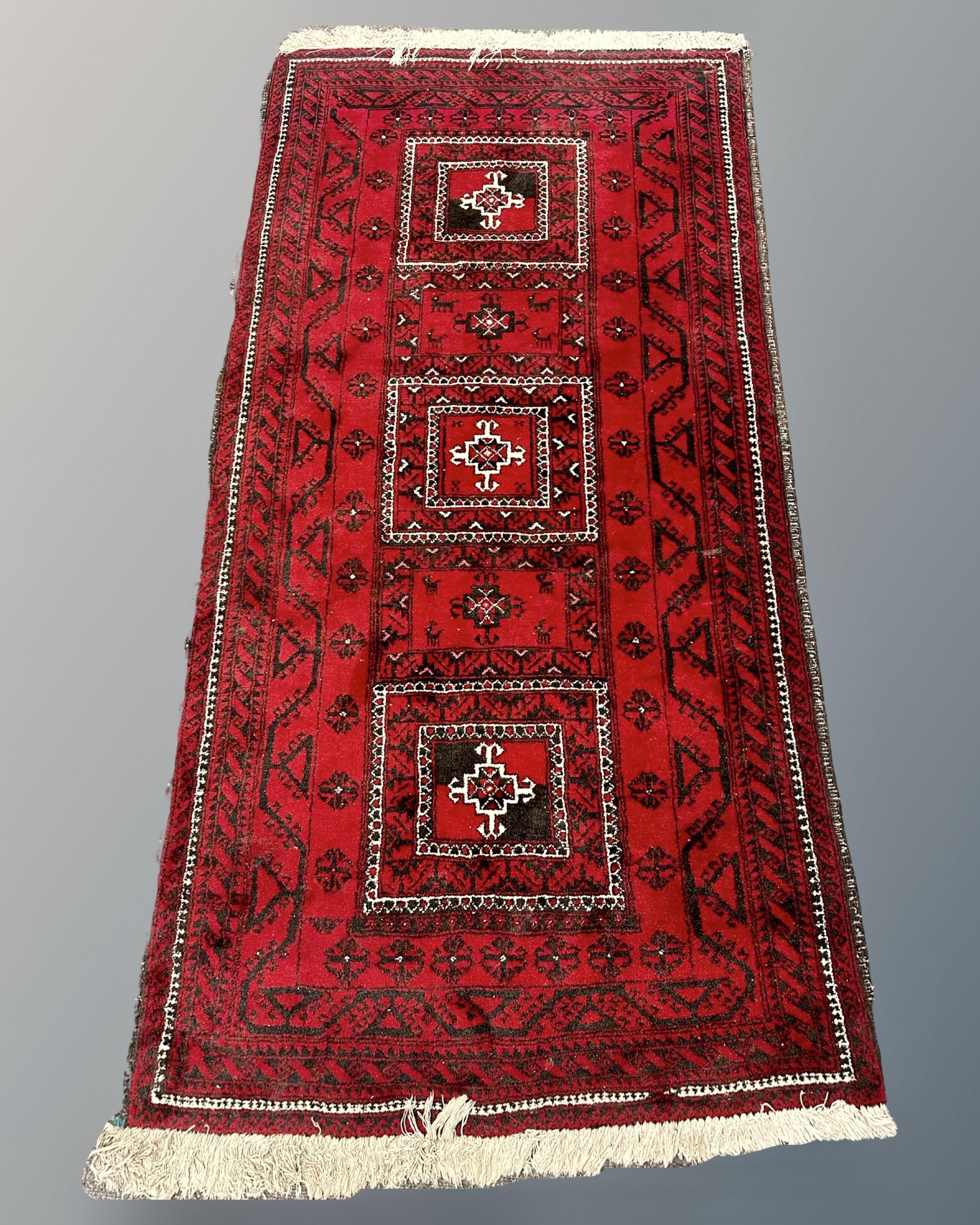 An Afghan long rug,