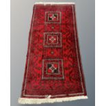 An Afghan long rug,