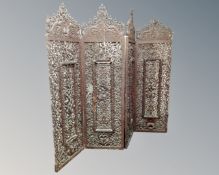 An Indonesian heavily carved four fold screen,