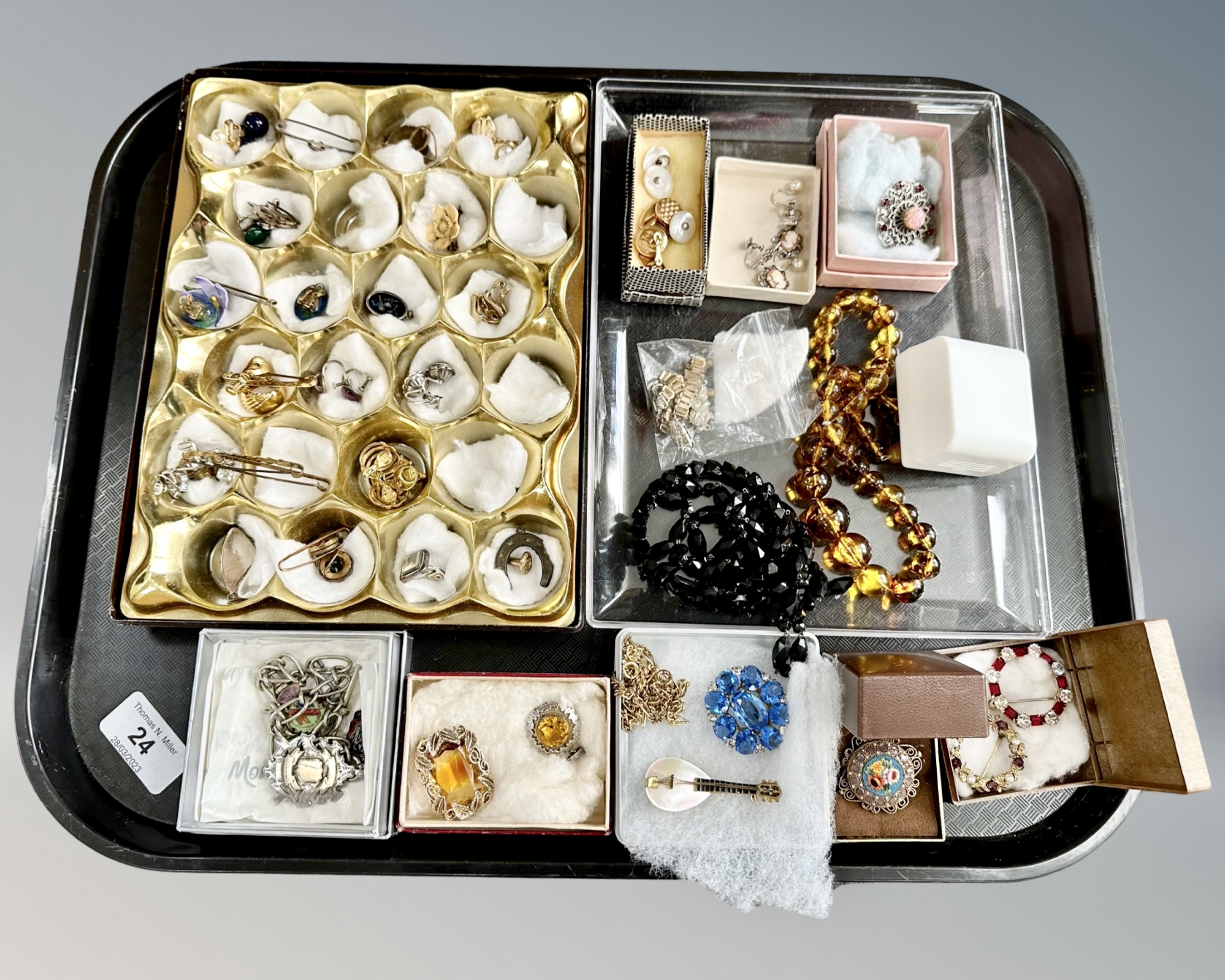 A tray of mixed costume jewellery including earrings, cuff links, Italian micro mosaic brooch,