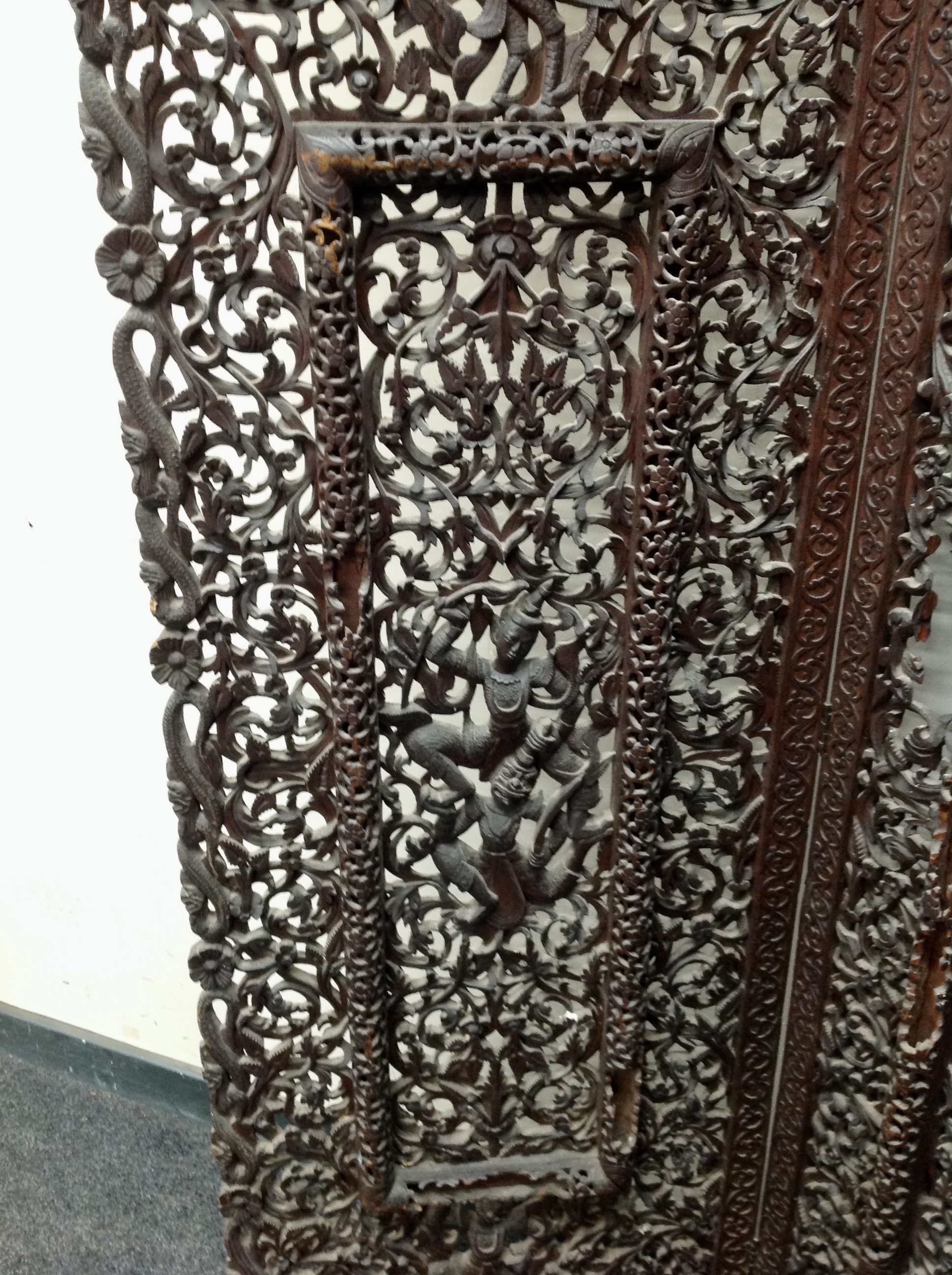 An Indonesian heavily carved four fold screen, - Image 7 of 7