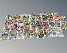 52 vintage Marvel comics including Dr. Strange and The Defenders.