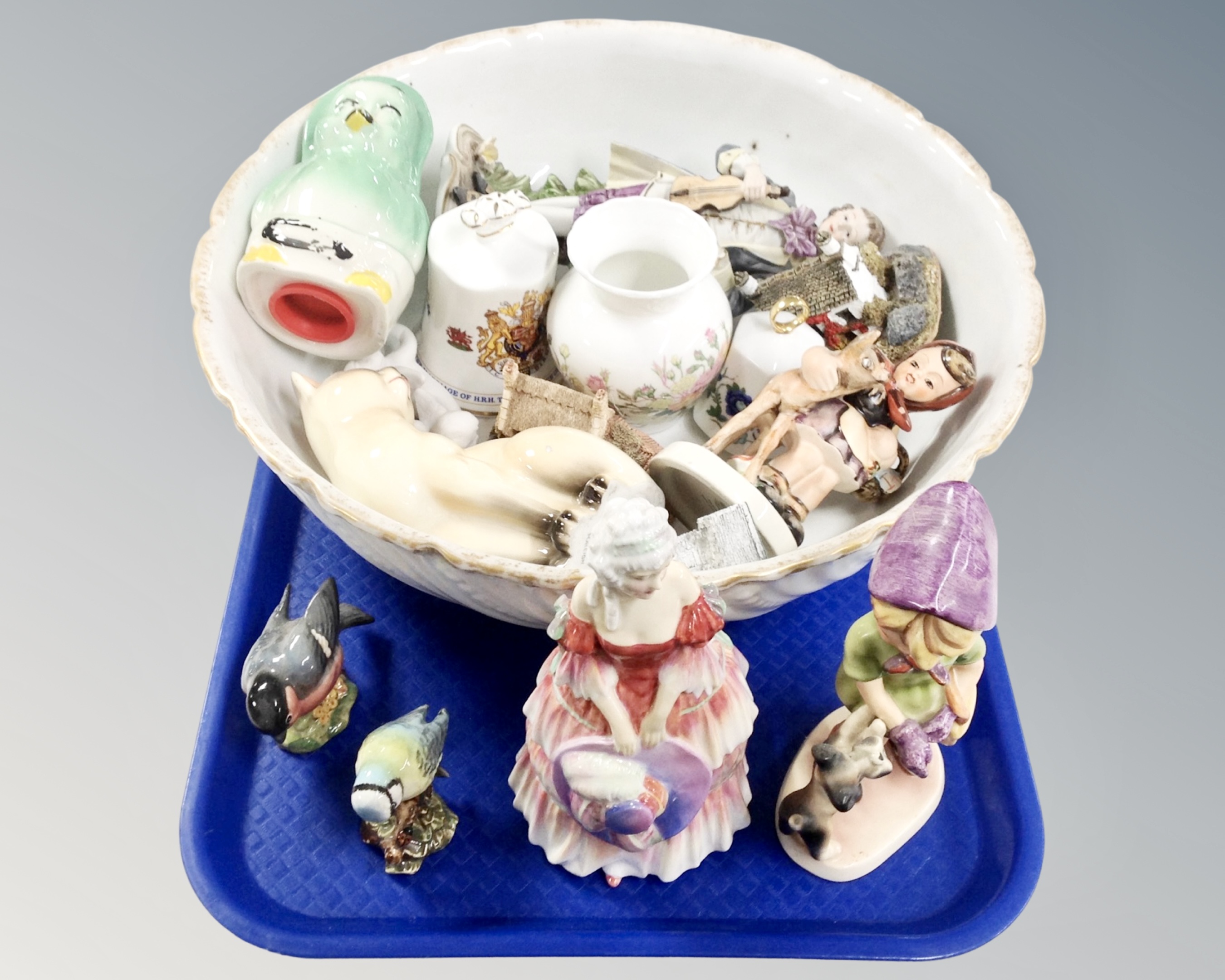 A tray containing assorted ceramics including an antique Limoges wash bowl, Royal Doulton figure,