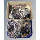 A tray containing a large quantity of assorted costume jewellery.