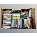 A box containing a large quantity of Blu-rays and DVDs including BBC Earth TV series, Vikings,