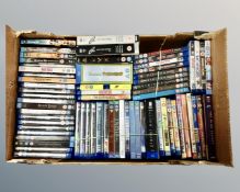 A box containing a large quantity of Blu-rays and DVDs including BBC Earth TV series, Vikings,