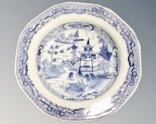 A 19th century Chinese glazed porcelain willow pattern dish (diameter 22.