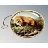 A fine 15ct gold mounted oval porcelain brooch depicting a fox and hare, width 73mm.