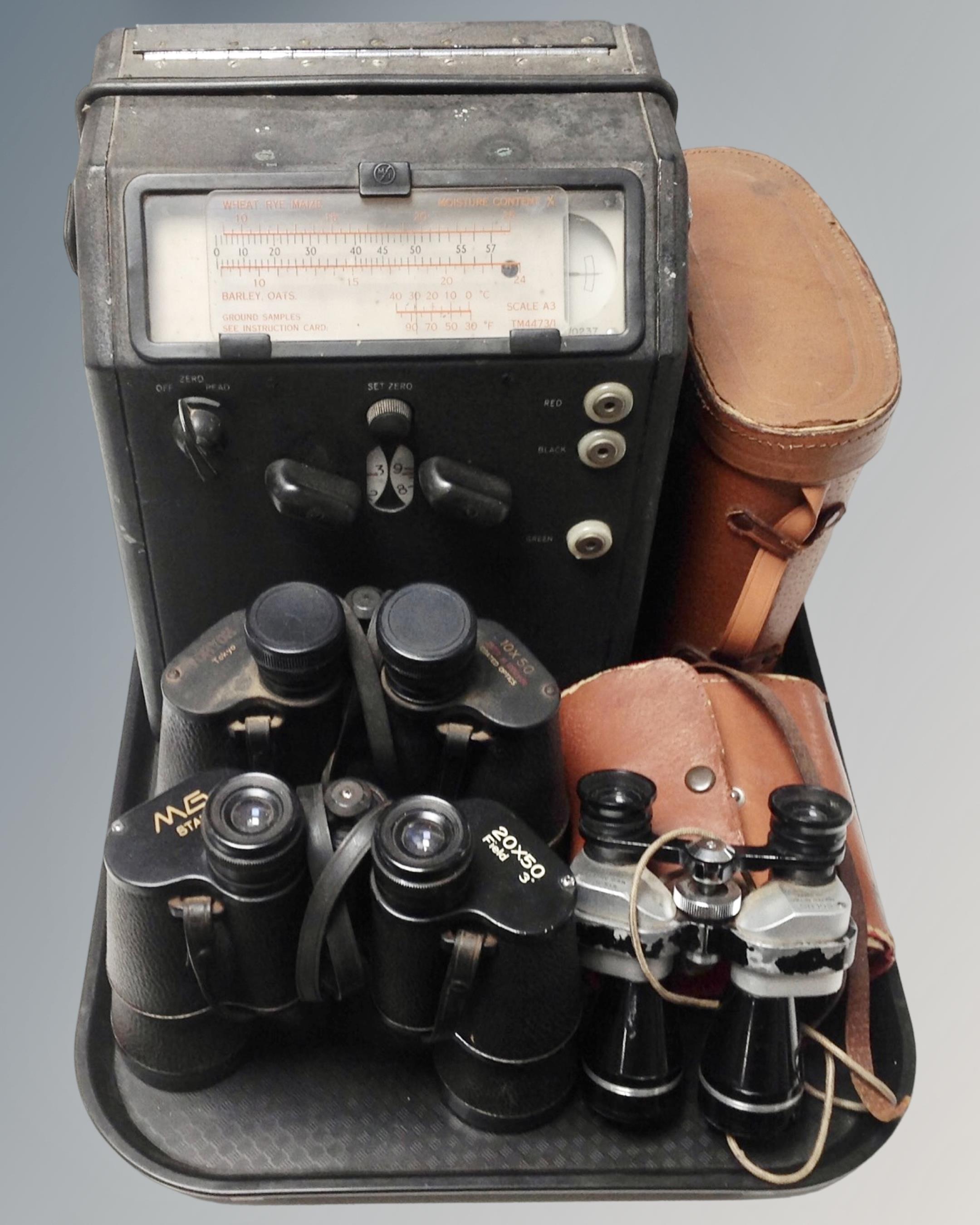 A Marconi moisture meter together with three pairs of field glasses including Tohyoh MG star and