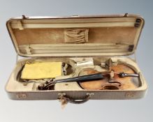 An early 19th century violin, one-piece 14" back, unlabeled interior, in a faux crocodile skin case.