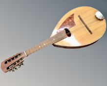 A vintage Czechoslovakian 10 string mandolin.