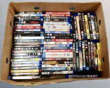 A box containing a large quantity of Blu-rays including Deadpool, Magnificent 7,